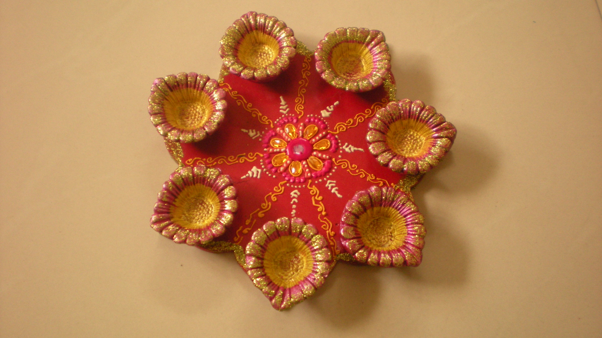 Manufacturers Exporters and Wholesale Suppliers of Rangoli diya plates 03 Nagpur Maharashtra